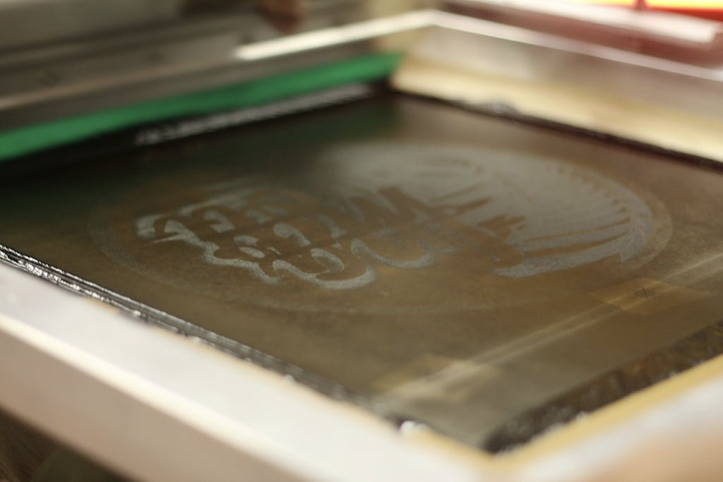 Close up image of a screen printing ink well